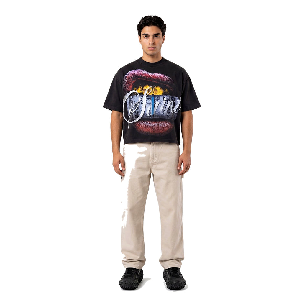 Model in the black boxy cropped graphic streetwear tee (print 3)