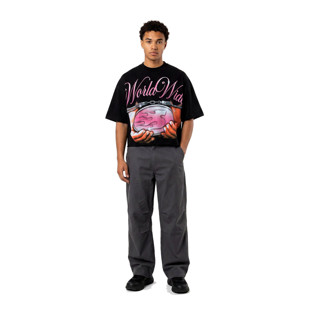 Model wearing black boxy cropped graphic tee (print 5)