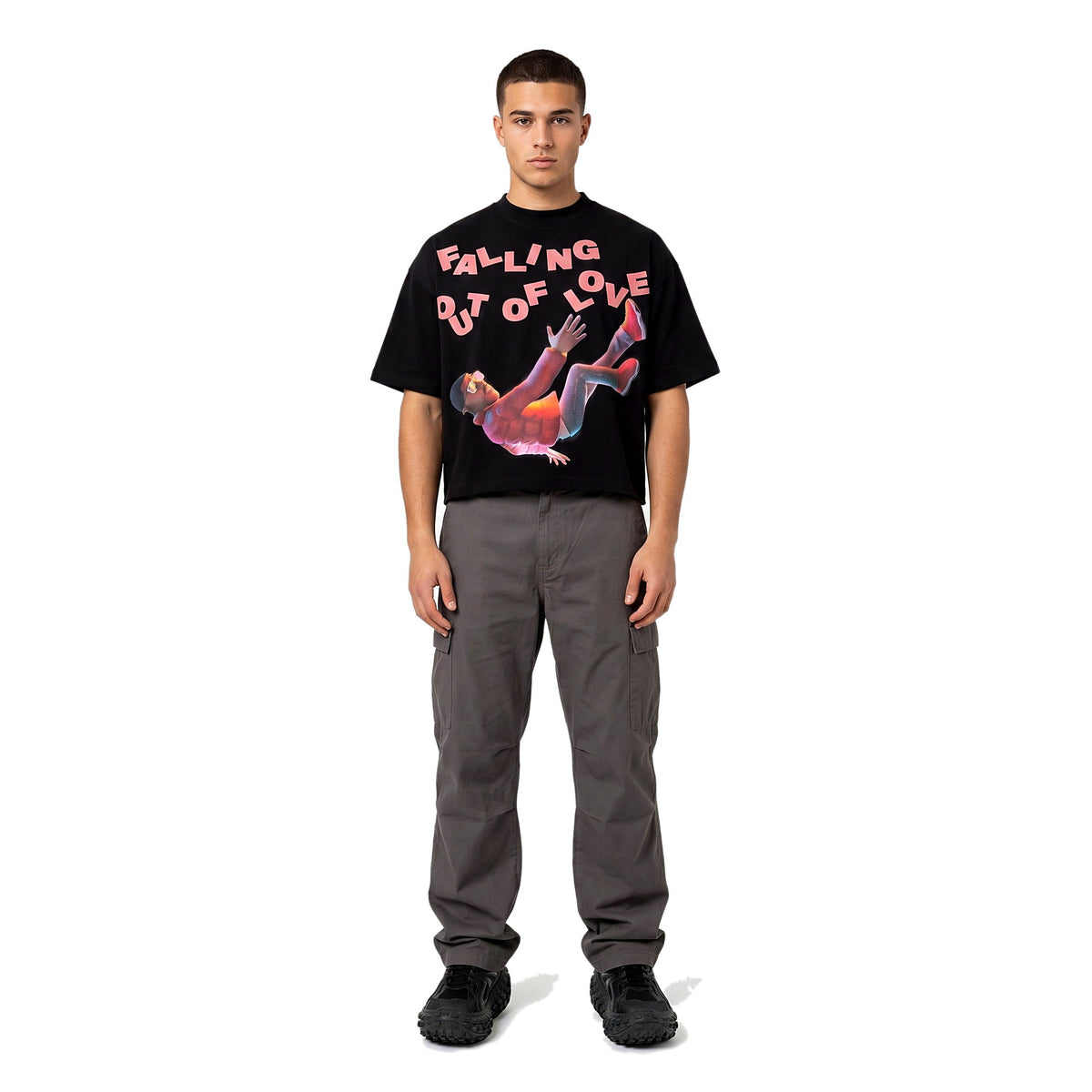 Model in black boxy cropped graphic tee, Y2K print 7