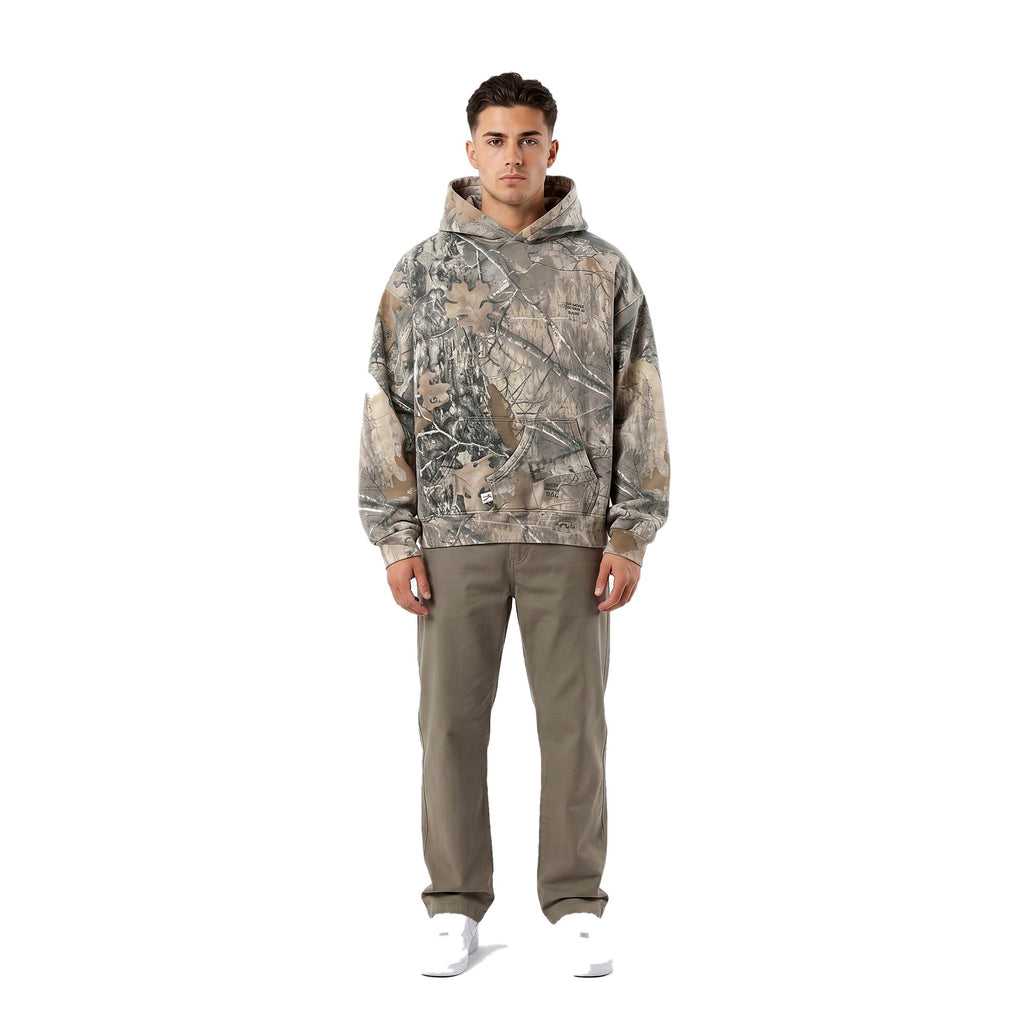 Man in the camo oversized pullover hoodie, Y2K streetwear