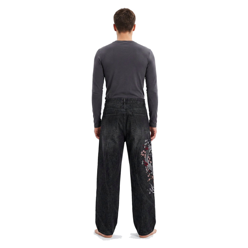 Back view of embroidered baggy jeans in a dark wash