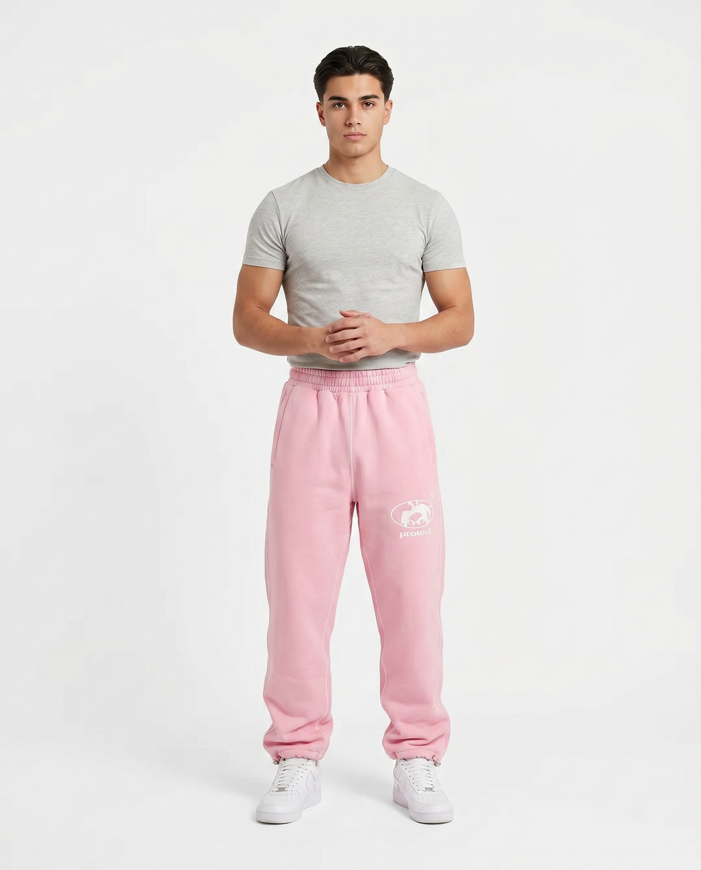 Model wearing the Protect embroidered sweatpants, streetwear