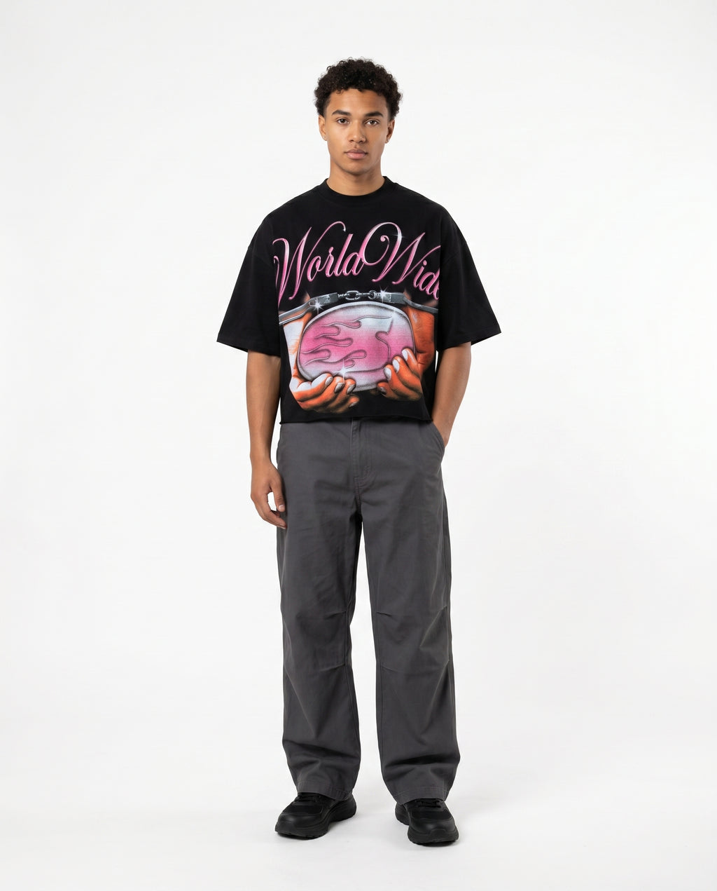 Model wearing black boxy cropped graphic tee (print 5)