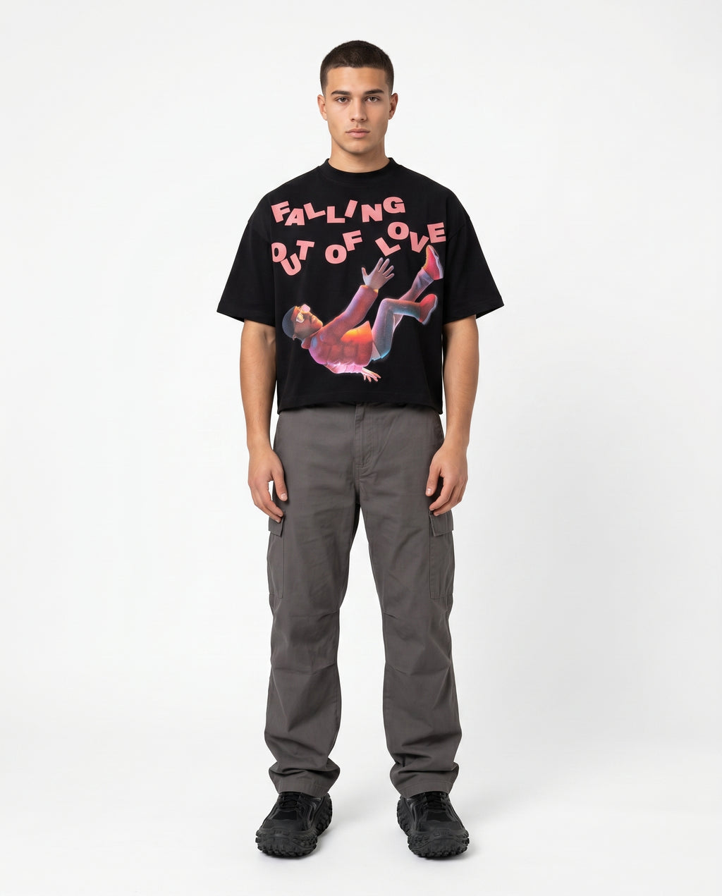 Model in black boxy cropped graphic tee, Y2K print 7