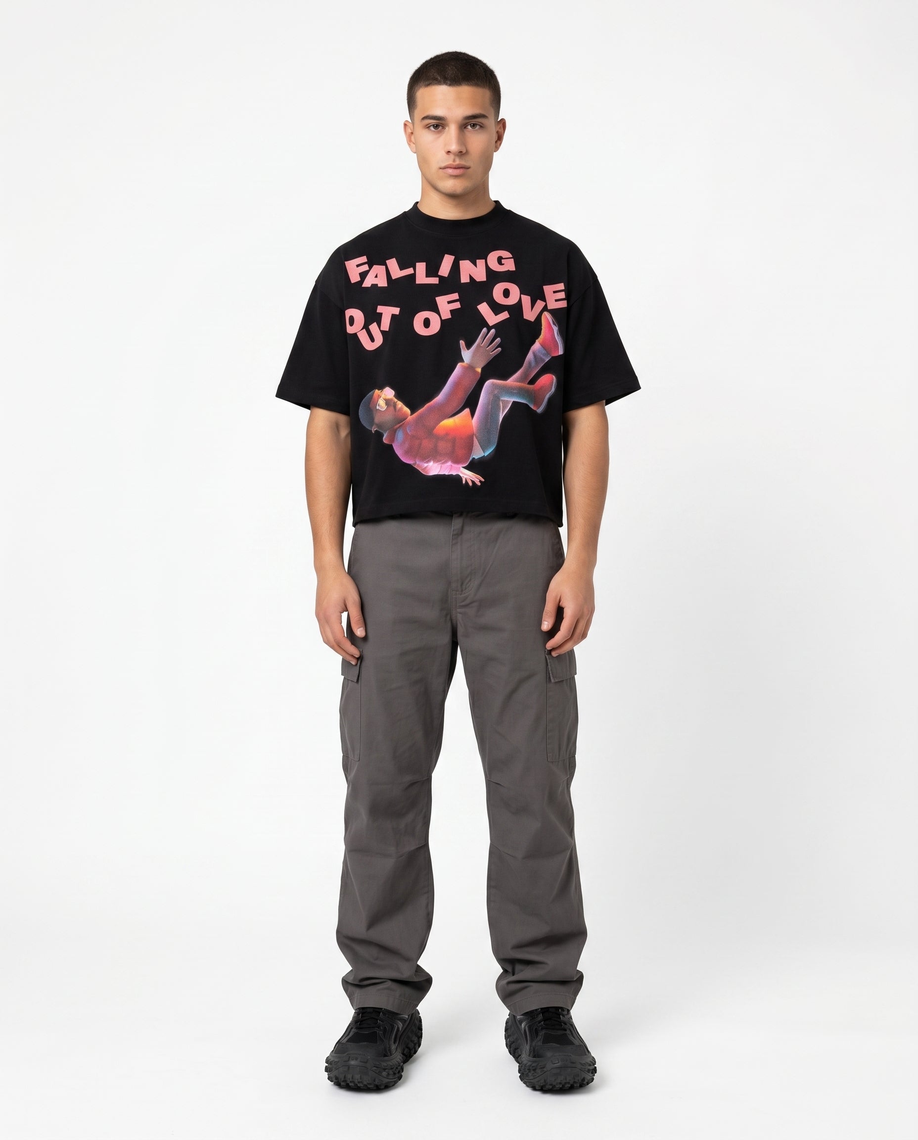 Model in black boxy cropped graphic tee, Y2K print 7