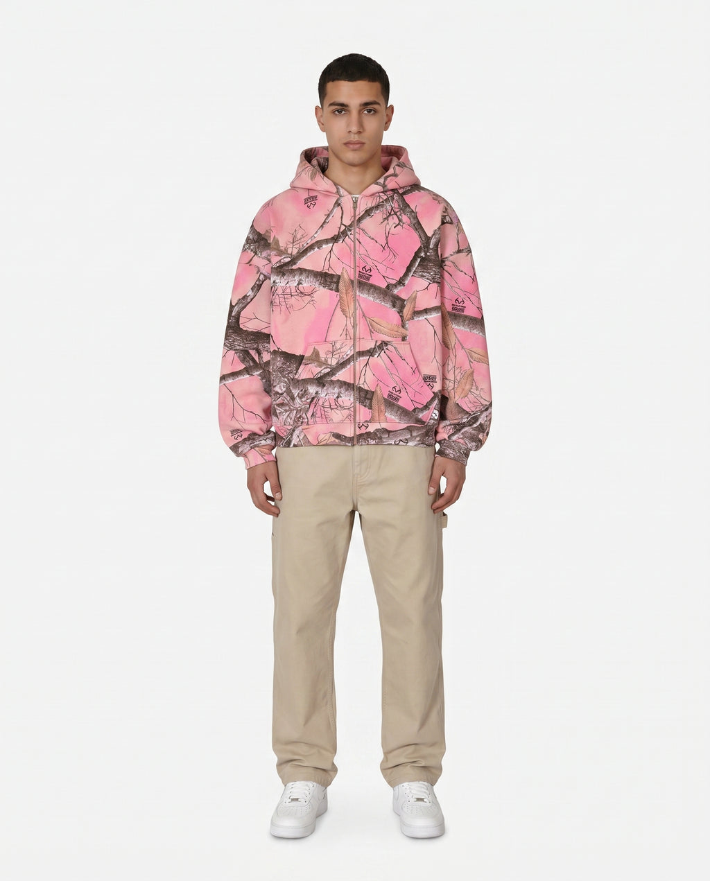 Male model in the pink camo zip-up hoodie, streetwear