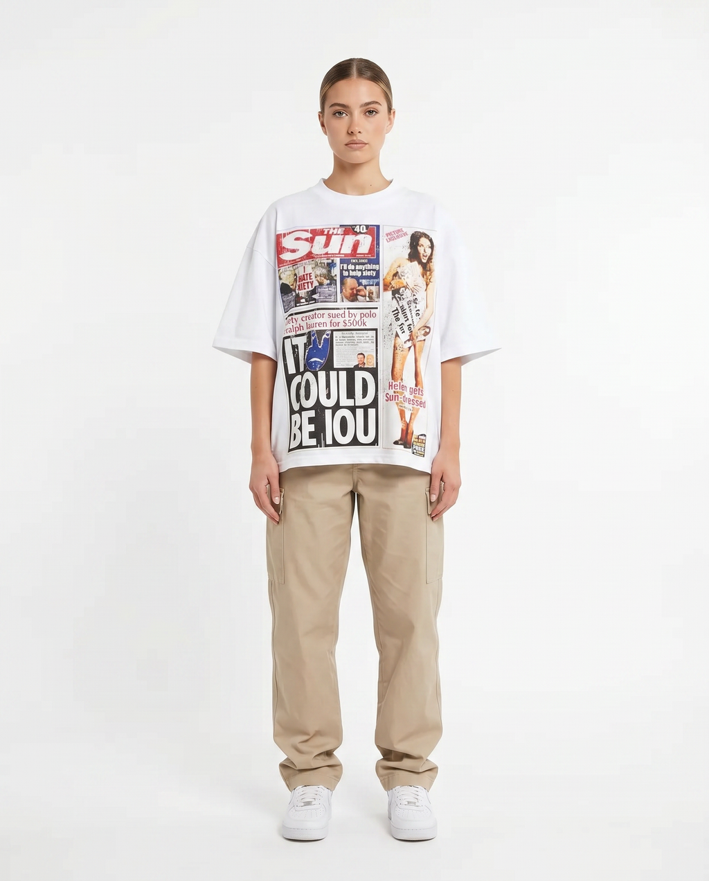 Female model in the white newsprint graphic oversized tee, Y2K streetwear