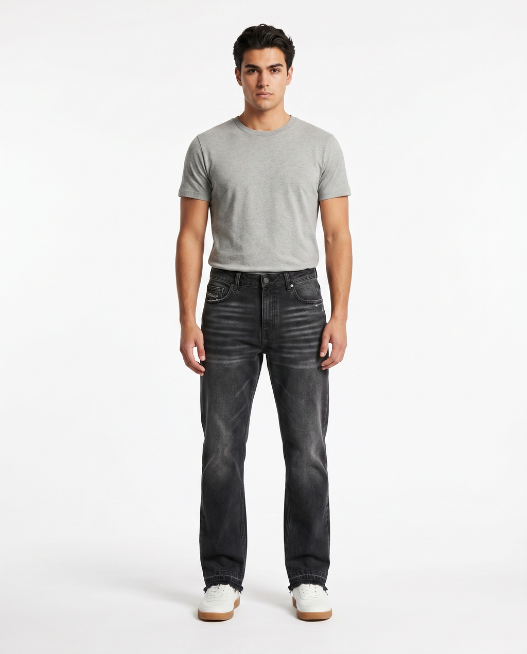 Male model wearing washed straight-leg jeans in black