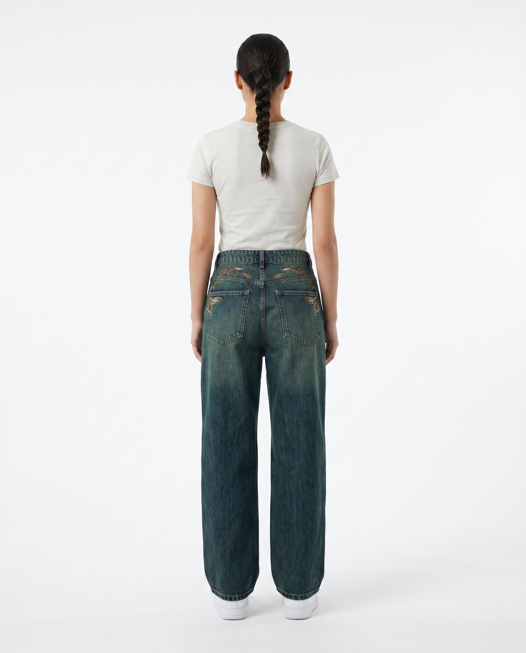 Rear view of embroidered wide-leg baggy denim jeans