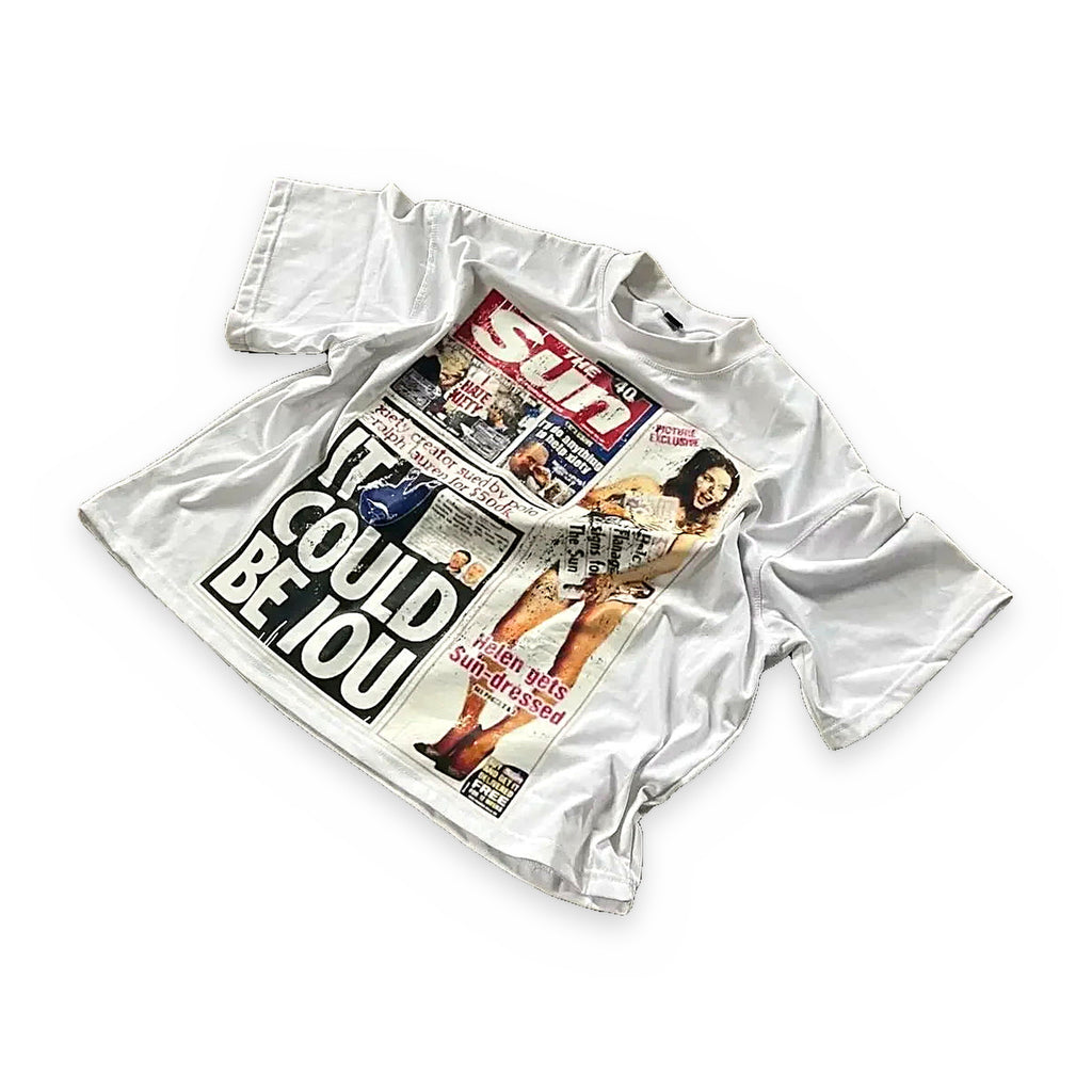 White newsprint graphic oversized tee — detail view