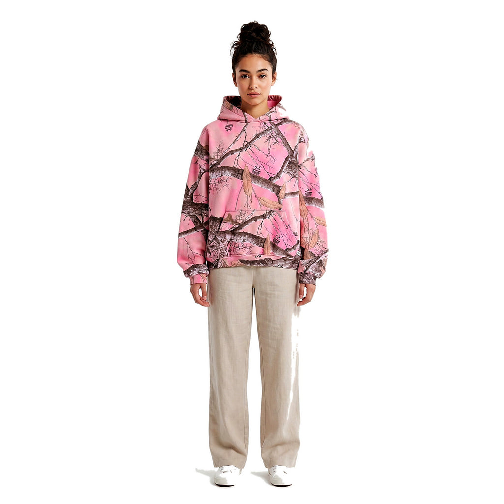 Female model in the pink camo pullover hoodie