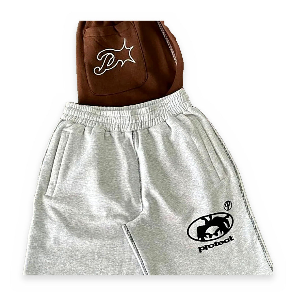Protect embroidered shorts in brown, streetwear — front view