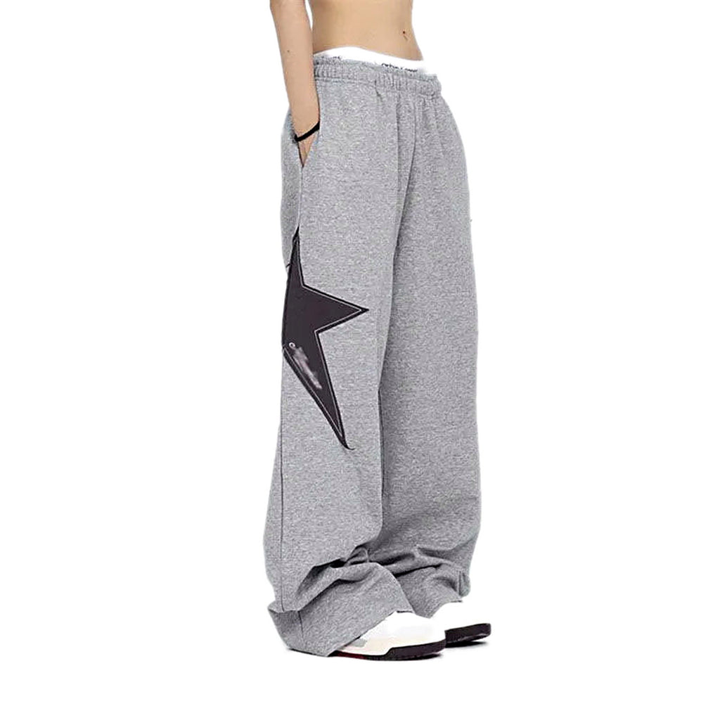 Grey star embroidered baggy sweatpants — front view